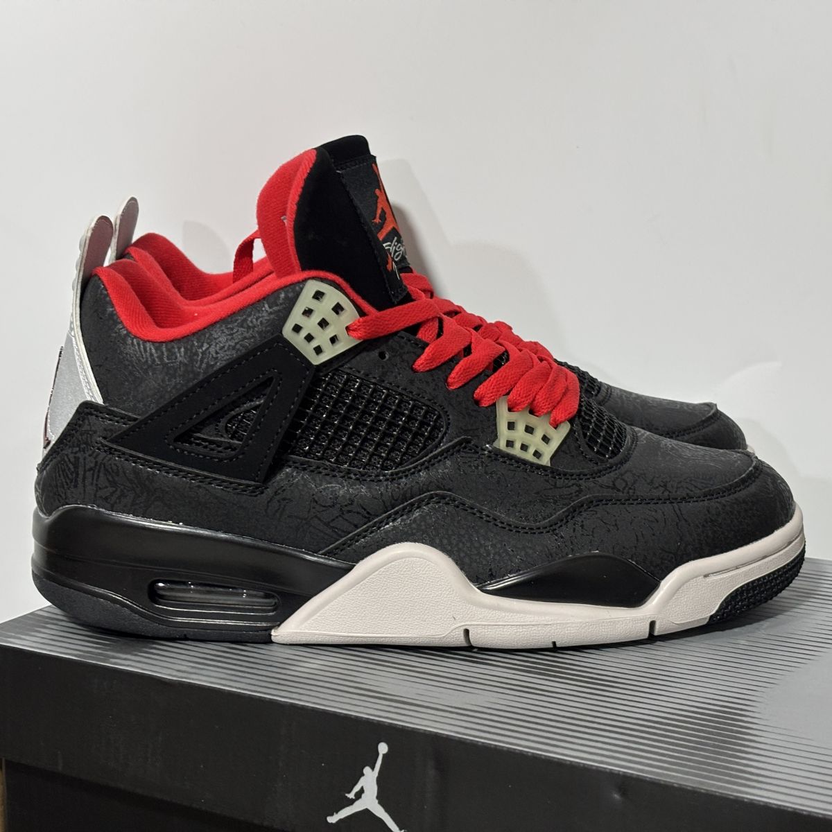 AJ4黑红雕刻 Air Jordan 4 Retro Laser 舒适贴合 复古篮球鞋 男女同款 IR2070-001