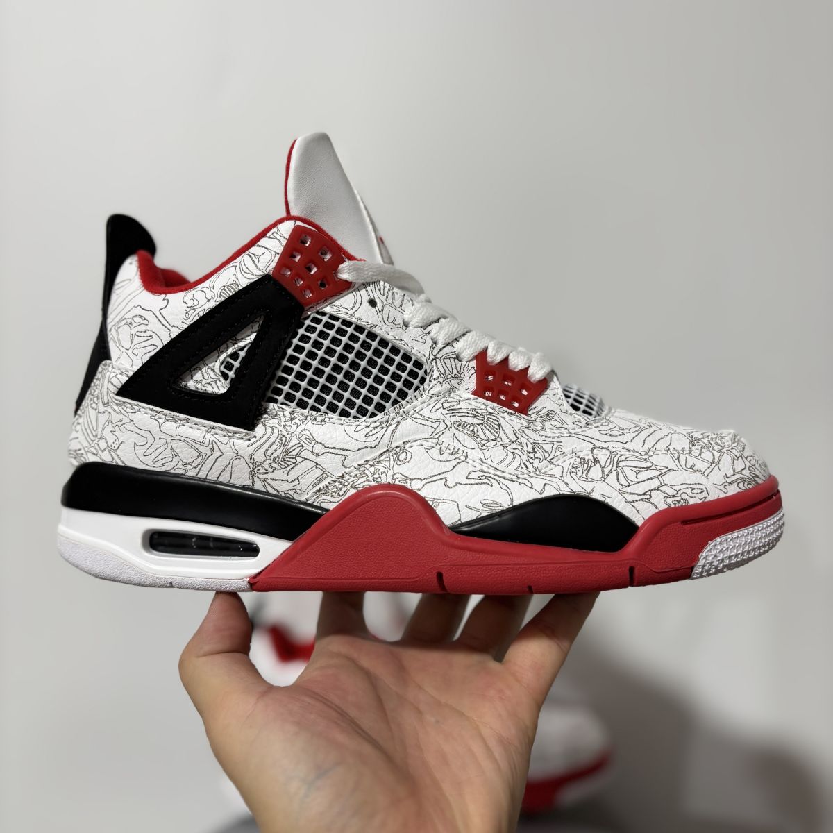 AJ4白红雕刻 Air Jordan 4 Retro Laser 舒适贴合 复古篮球鞋 男女同款 IR2070-100